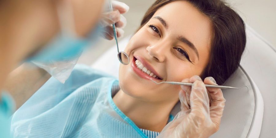 Dentistry,,Dentist,Clinic,Appointment,For,Happy,Smiling,Woman,,Healthy,Smile, general dentist east boston preventative dentistry near me