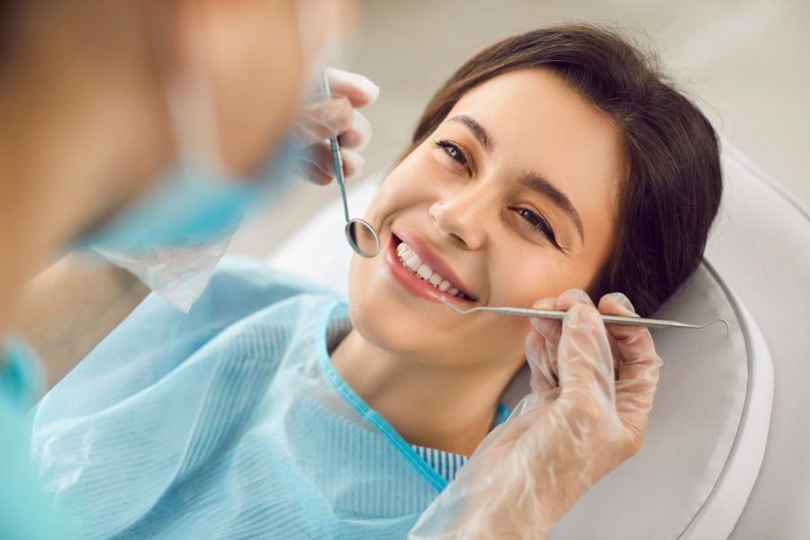 Dentistry,,Dentist,Clinic,Appointment,For,Happy,Smiling,Woman,,Healthy,Smile, general dentist east boston preventative dentistry near me